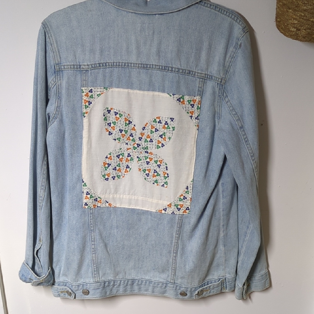 Light Blue Denim Jacket with Colorful Patch